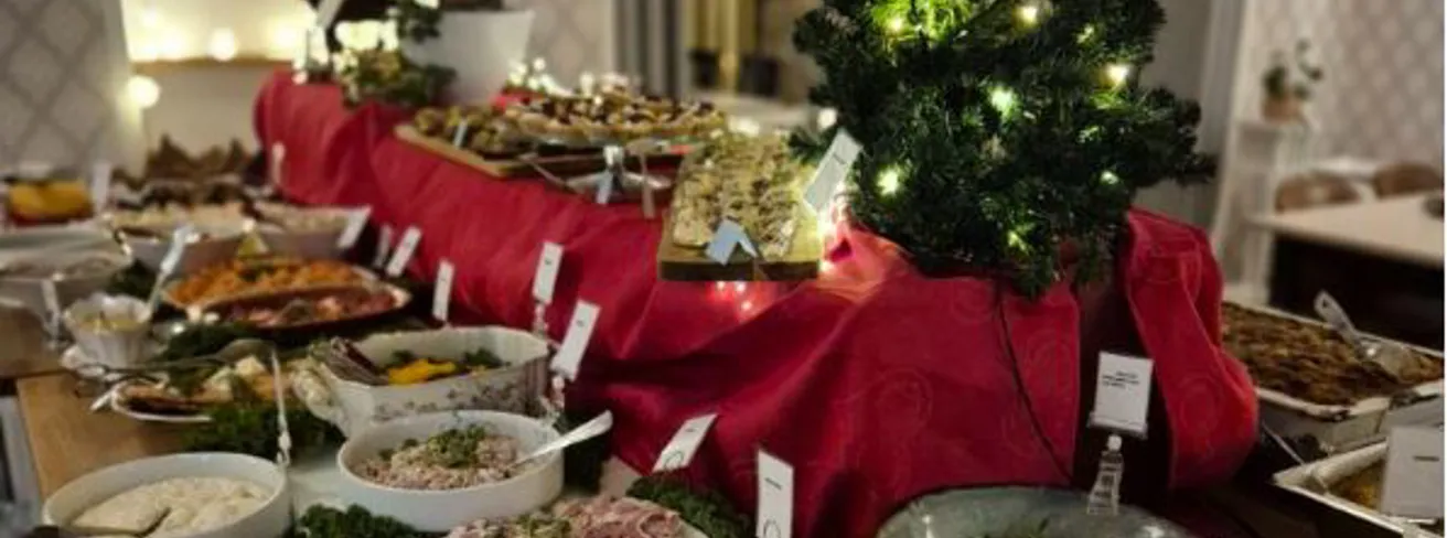 Bild som illustrerar Julbord-en mysig stund i ombonad julstämning